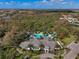 Expansive community with lush greenery, lakes, and a central pool area at 11435 Fort Lauderdale Pl, Venice, FL 34293