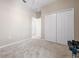Unfurnished bedroom with lots of closet space, ideal for storage and organization at 11435 Fort Lauderdale Pl, Venice, FL 34293