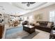 The open concept living space merges the kitchen, dining, and living areas at 11435 Fort Lauderdale Pl, Venice, FL 34293