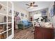 Versatile office space with hardwood floors, ceiling fan, and natural light at 11435 Fort Lauderdale Pl, Venice, FL 34293