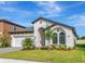 Charming single-story home with a well-manicured lawn and an attached two-car garage at 12613 Oak Hill Way, Parrish, FL 34219