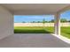 Covered patio overlooking a spacious, fenced backyard at 12613 Oak Hill Way, Parrish, FL 34219