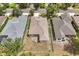 Detailed aerial shot of a house with a fenced backyard, offering privacy and outdoor living space at 12642 Cara Cara Loop, Bradenton, FL 34212