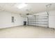 Spacious two-car garage with automatic door and room for storage, perfect for parking and projects at 12642 Cara Cara Loop, Bradenton, FL 34212