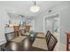 Cozy dining area next to kitchen featuring an open-concept floor plan at 1280 Dolphin Bay Way # 204, Sarasota, FL 34242
