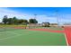 Well-maintained tennis courts in a beautiful park, perfect for recreation and sports enthusiasts at 1280 Dolphin Bay Way # 204, Sarasota, FL 34242