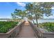Outdoor view of a waterfront pier at 1280 Dolphin Bay Way # 204, Sarasota, FL 34242