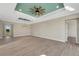 Bright living room featuring tile flooring, recessed lighting, and a decorative ceiling fan at 144 Spring Dr, Rotonda West, FL 33947