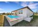Picture of home's backyard pool area with convenient access to the house at 144 Spring Dr, Rotonda West, FL 33947