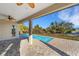 Beautiful outdoor living space with a refreshing pool and patio area at 144 Spring Dr, Rotonda West, FL 33947