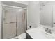 Bathroom offers a glass enclosed shower, neutral decor, and large sink and vanity with modern fixtures at 157 Pinehurst Dr # 157, Bradenton, FL 34210