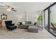 Comfortable living room with plush seating and view of the outdoors at 157 Pinehurst Dr # 157, Bradenton, FL 34210