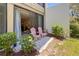 Relaxing patio with outdoor seating surrounded by lush greenery, providing a tranquil escape at 157 Pinehurst Dr # 157, Bradenton, FL 34210