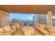Outdoor balcony featuring elegant furniture with ocean and resort views at 1591 Gulf Of Mexico Dr # 511, Longboat Key, FL 34228