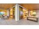 Wide balcony with outdoor dining and lounge seating at 1591 Gulf Of Mexico Dr # 511, Longboat Key, FL 34228