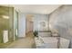 Bright bathroom with sleek vanity, modern tub, and walk-in shower at 1591 Gulf Of Mexico Dr # 511, Longboat Key, FL 34228