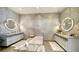 Stylish bathroom with dual vanities, freestanding tub, and decorative wall art at 1591 Gulf Of Mexico Dr # 511, Longboat Key, FL 34228