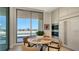 Bright breakfast nook with round table, seating for four, and balcony access at 1591 Gulf Of Mexico Dr # 511, Longboat Key, FL 34228