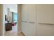 Hallway with closet leading to ocean-view room at 1591 Gulf Of Mexico Dr # 511, Longboat Key, FL 34228