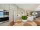 Modern kitchen and appliances lead into the expansive living space at 1591 Gulf Of Mexico Dr # 511, Longboat Key, FL 34228