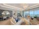 Open-concept living area with stylish furnishings, ocean views, and elegant decor at 1591 Gulf Of Mexico Dr # 511, Longboat Key, FL 34228