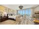Stunning main bedroom with ocean view and seating area at 1591 Gulf Of Mexico Dr # 511, Longboat Key, FL 34228