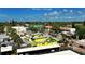 Aerial view of Siesta Key Village with colorful buildings and lush green trees at 19 Whispering Sands Dr # 805, Sarasota, FL 34242