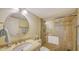 Bathroom featuring a vanity, shower with glass door, and neutral color scheme at 19 Whispering Sands Dr # 805, Sarasota, FL 34242