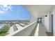 Condo hallway with tile flooring and views of the city and water at 19 Whispering Sands Dr # 805, Sarasota, FL 34242