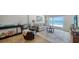Comfortable living room with a sofa and recliner, offering stunning beach views at 19 Whispering Sands Dr # 805, Sarasota, FL 34242