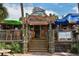 A charming restaurant exterior with a welcoming entrance and outdoor seating area at 19 Whispering Sands Dr # 805, Sarasota, FL 34242