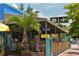 A tropical-themed tiki bar with a thatched roof and bamboo accents at 19 Whispering Sands Dr # 805, Sarasota, FL 34242