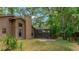 A wooded lot enhances the property's appeal with mature trees at 2061 Misty Sunrise Trl, Sarasota, FL 34240