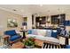Inviting living room showcasing designer furnishings, decorative lighting, and an open floorplan at 21225 Wacissa Dr, Venice, FL 34293
