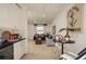 Cozy living area with nautical decor, comfortable seating, and a bright, airy ambiance at 21225 Wacissa Dr, Venice, FL 34293