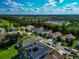 A peaceful home in a community with plenty of trees with an electric sub-station nearby at 230 Fareham Dr, Venice, FL 34293