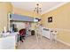 Bedroom featuring tile floors, bunk bed and lots of natural light at 230 Fareham Dr, Venice, FL 34293