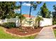 A warm welcome to Fairway Village, complete with a lush landscape and meticulously maintained lawns at 230 Fareham Dr, Venice, FL 34293