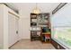 Cozy nook with oven, shelves and storage, with bright natural light at 230 Fareham Dr, Venice, FL 34293