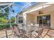 Relaxing screened patio with outdoor seating, perfect for enjoying the fresh air at 230 Fareham Dr, Venice, FL 34293