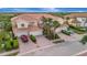 Beautiful townhouse with well maintained landscaping, red brick driveway, and a tile roof at 23233 Banbury Way # 302, Venice, FL 34293