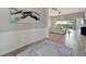View from foyer showcasing the living room featuring an outdoor patio at 23233 Banbury Way # 302, Venice, FL 34293