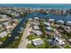 Stunning aerial view showcasing houses along winding canals, perfect for boating enthusiasts at 237 85Th St, Holmes Beach, FL 34217