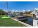 Picturesque waterfront featuring a private boat dock and canal with watercrafts at 237 85Th St, Holmes Beach, FL 34217