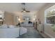 Bright living room with neutral furniture, windows and serene artwork at 237 85Th St, Holmes Beach, FL 34217