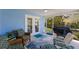 Comfortable screened patio with grill, perfect for outdoor entertainment and dining at 237 85Th St, Holmes Beach, FL 34217