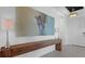 Inviting entryway showcasing a wood console table and modern artwork at 2578 Wild Cherry Path, Sarasota, FL 34240