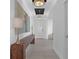 Bright entryway featuring modern lighting fixtures and contemporary design at 2578 Wild Cherry Path, Sarasota, FL 34240