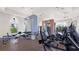 Well-equipped community gym with modern exercise machines, weights, and mirrors for a complete fitness experience at 2578 Wild Cherry Path, Sarasota, FL 34240