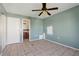 Cozy bedroom with tile floors and an en-suite bathroom at 2704 Hidden Lake Blvd # C, Sarasota, FL 34237